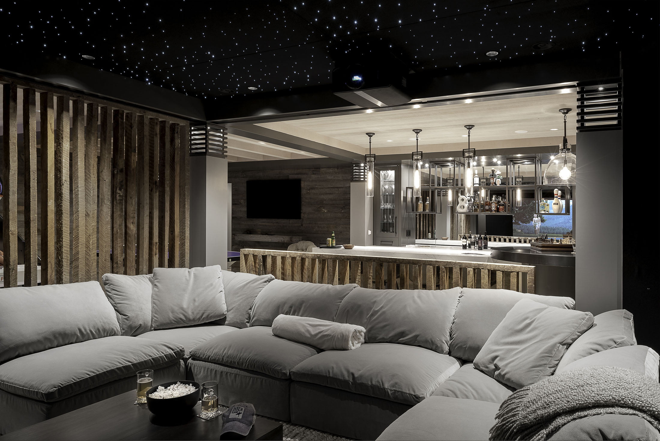 Luxurious basement living room with a starlight ceiling